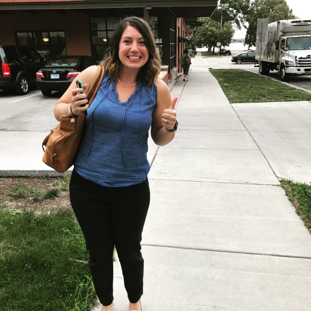 Blue shirt doctor in a parking lot